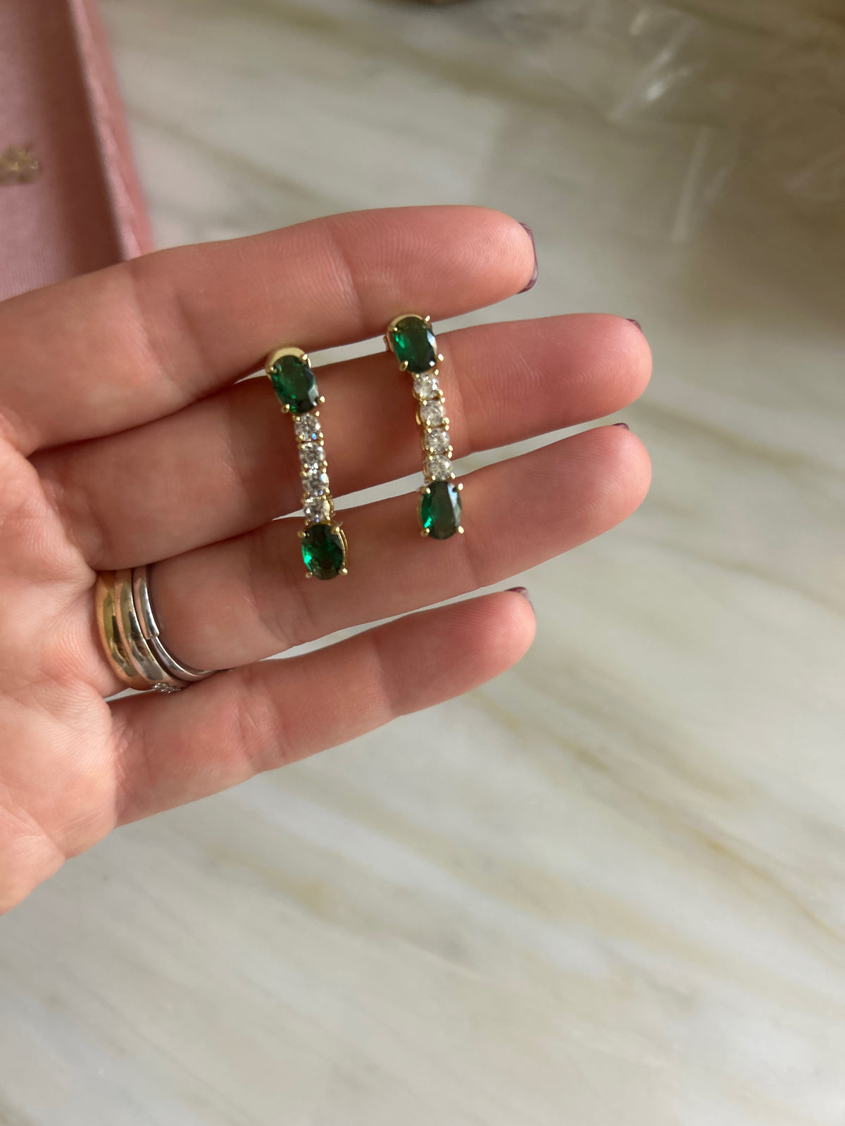Emerald tennis earrings