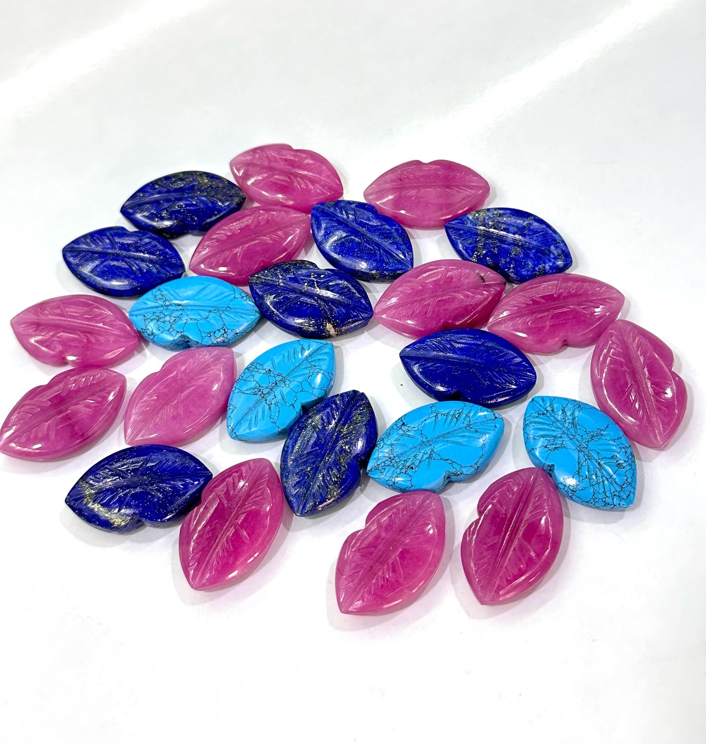 The kiss stone charm