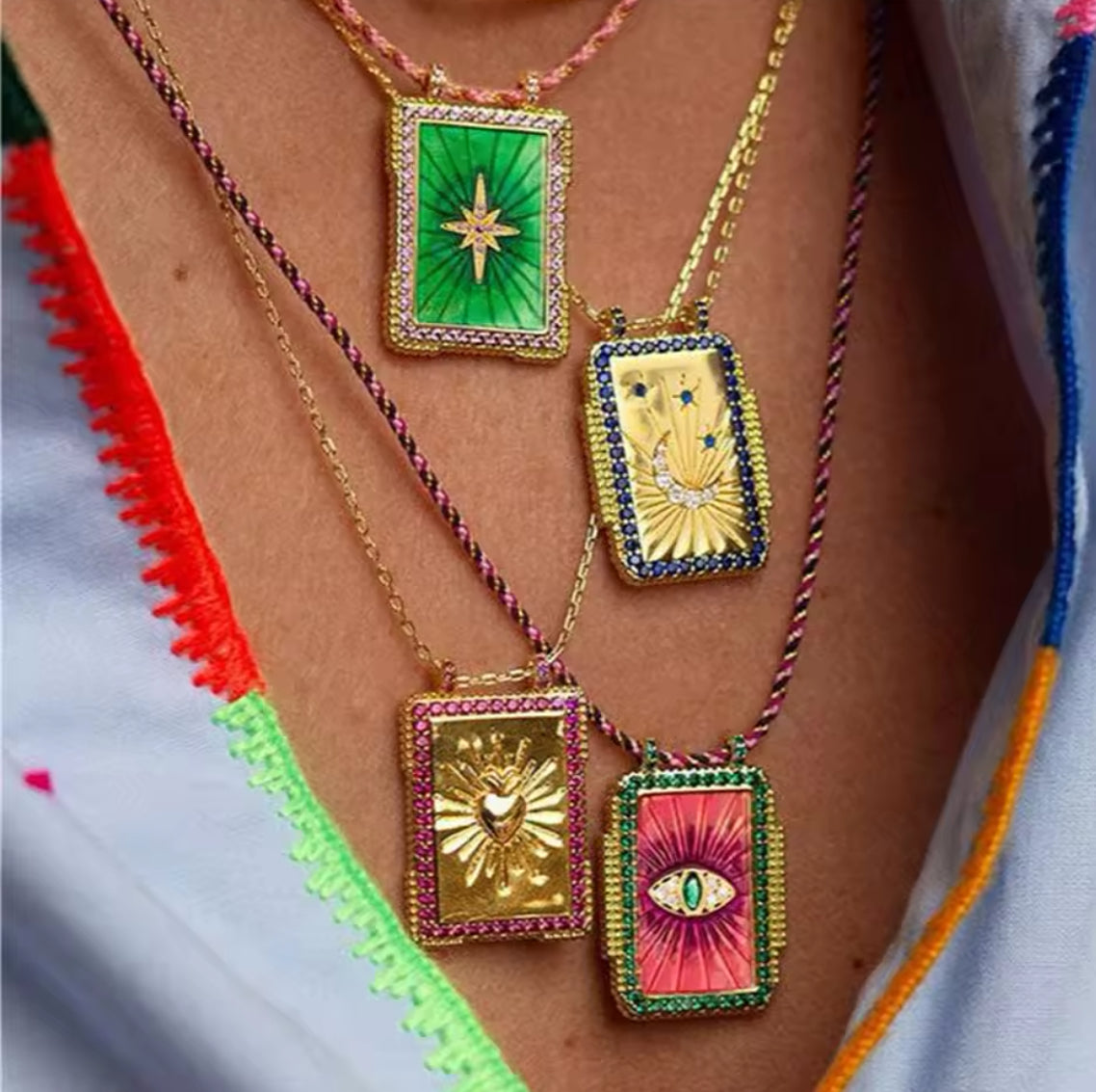 Enamel rectangular necklaces with color ropes.