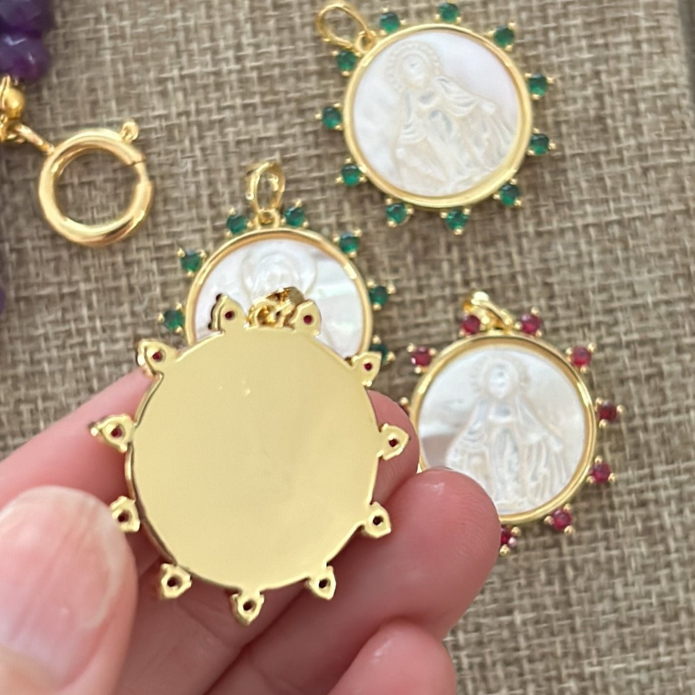 Mother of pearl and zirconia stones medal