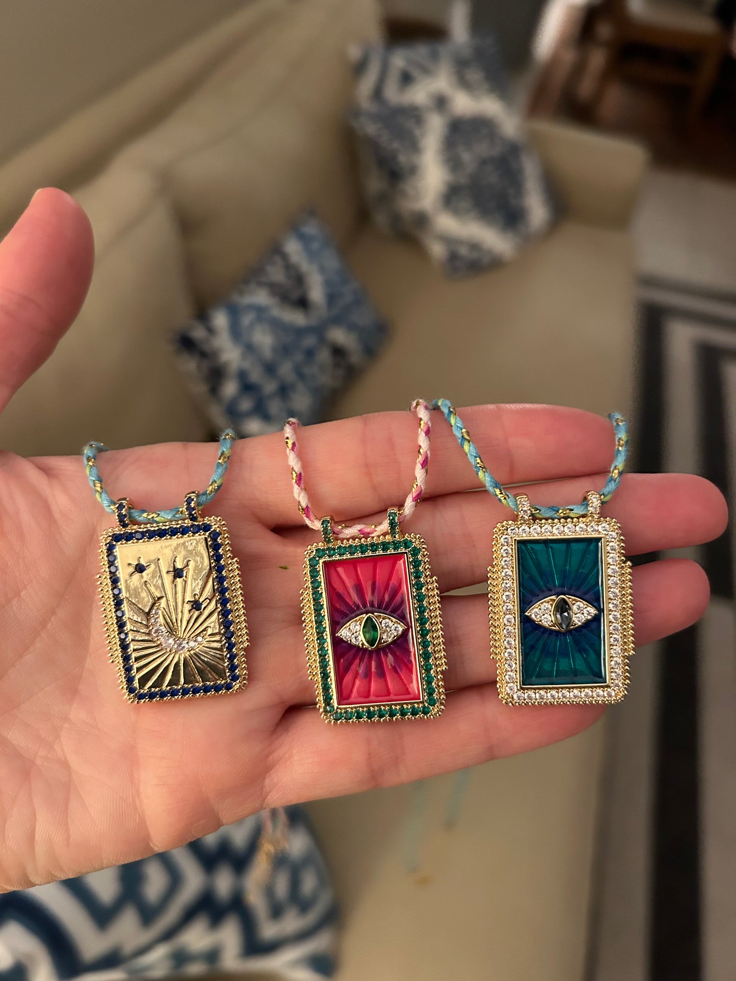 Enamel rectangular necklaces with color ropes.