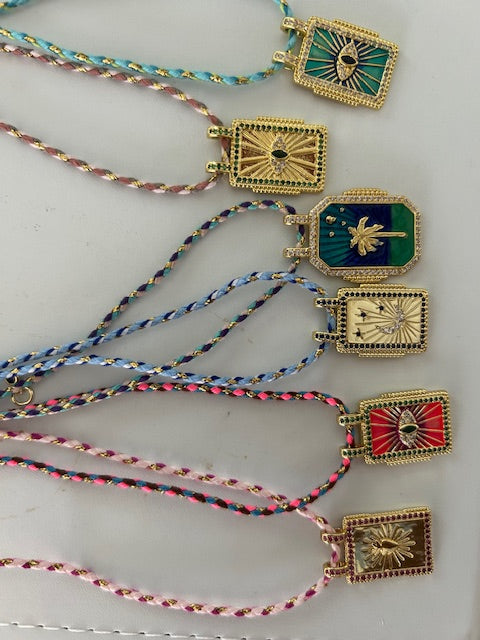 Enamel rectangular necklaces with color ropes.